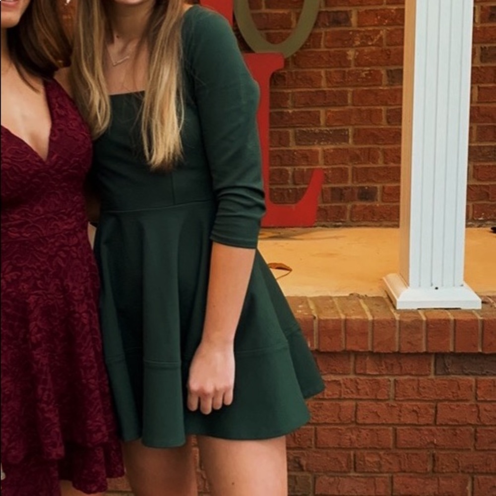 A dark green lulu’s dress that is size small
